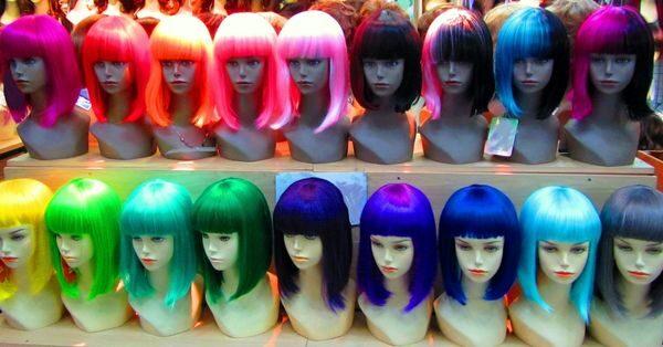 Wigs Website - Different coloured sample wigs on mannequin head