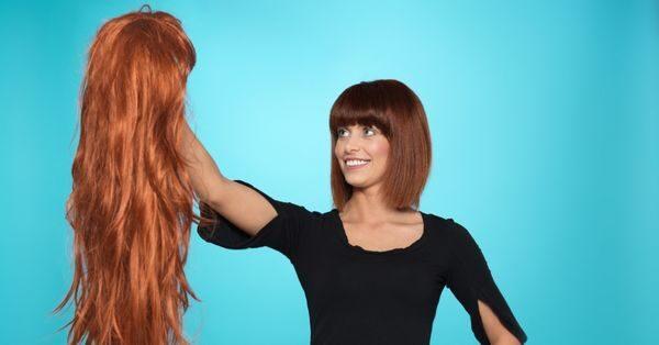 wigs long hair - Women examining a long hair wig